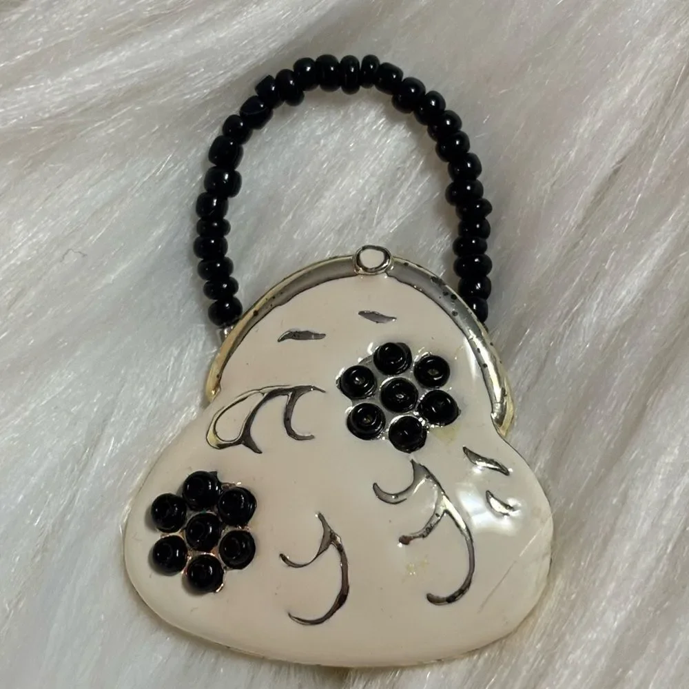Antique Black and Cream Floral Enamel Brooch